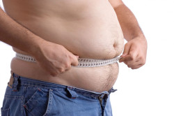Появление жировых отложений - причина кризиса у мужчин